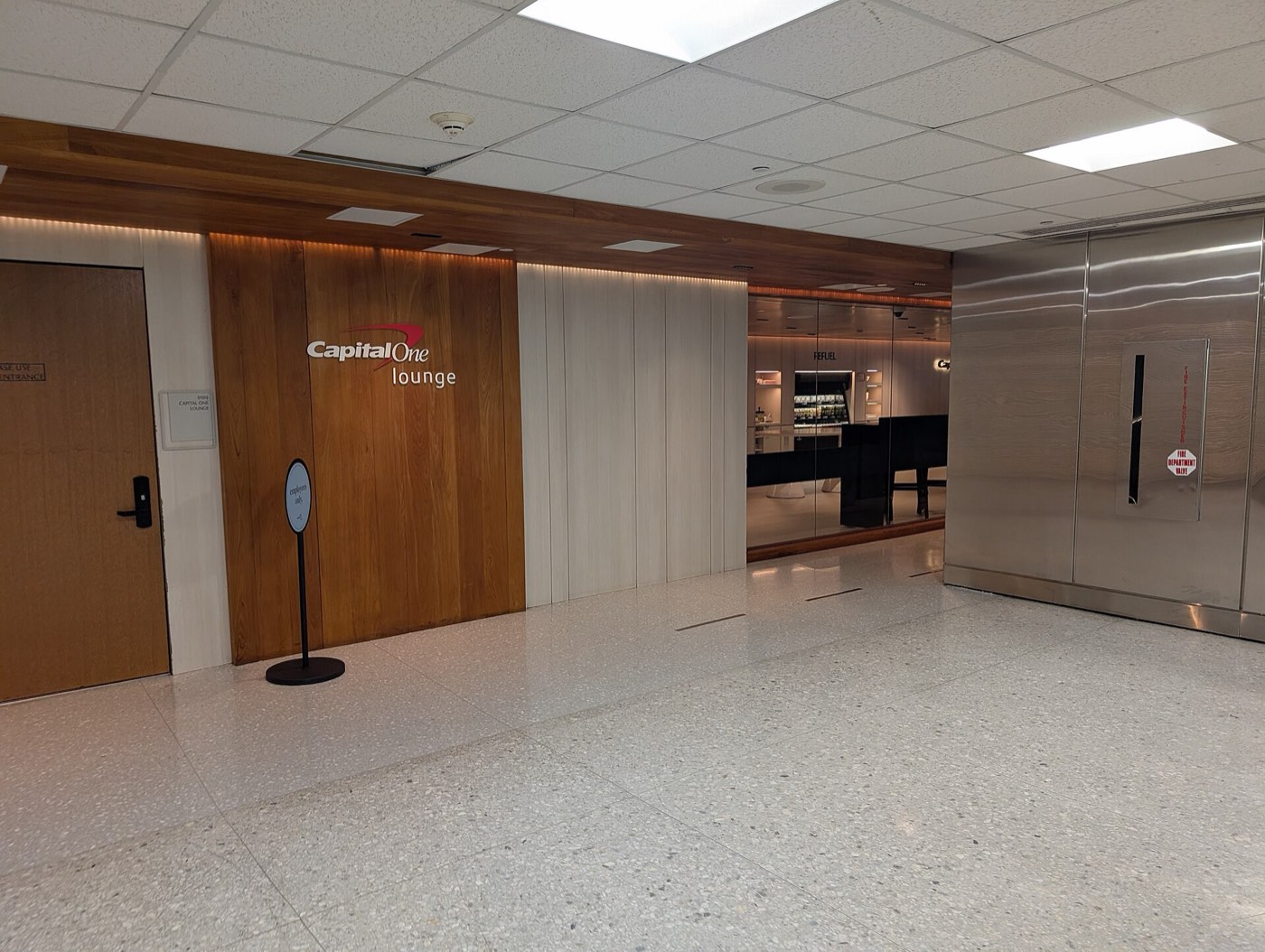 Entrance to a Capital One Lounge just past airport security